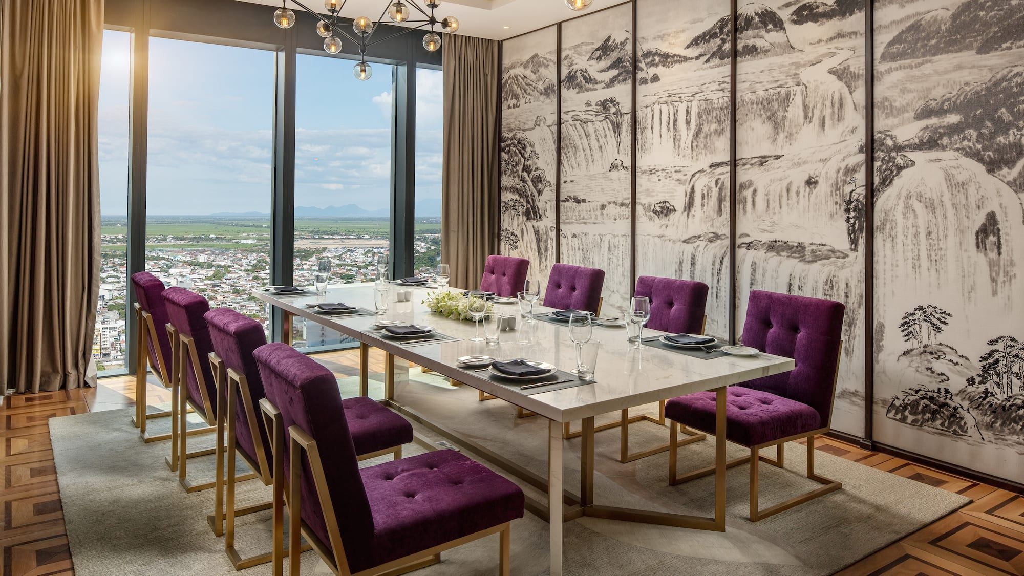 a dining room with purple chairs and a table