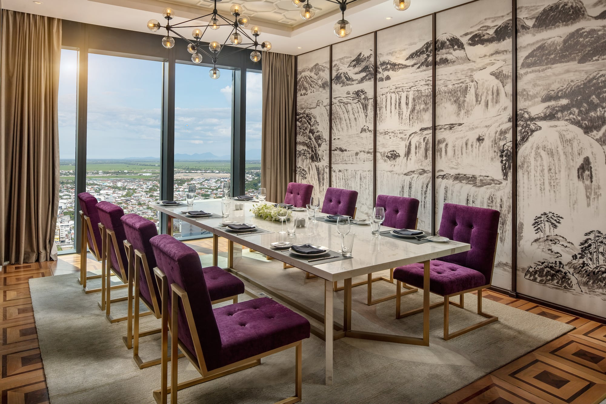 a dining room with purple chairs and a table