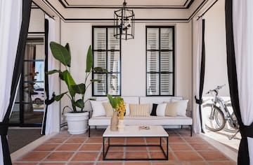 a room with a couch and a coffee table