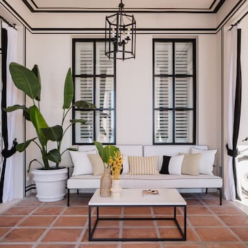 a room with a couch and a coffee table