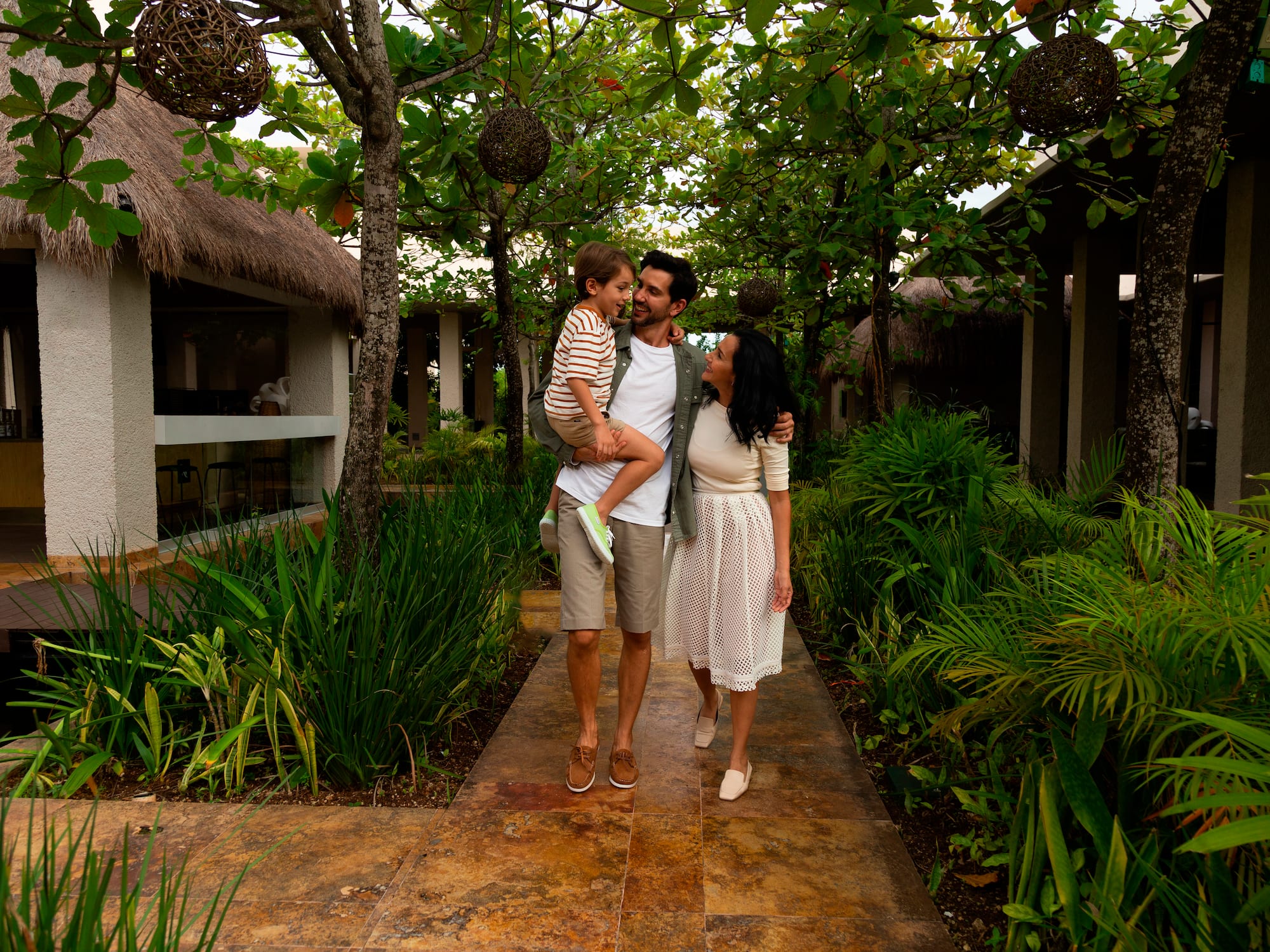 a man holding a child in his arms