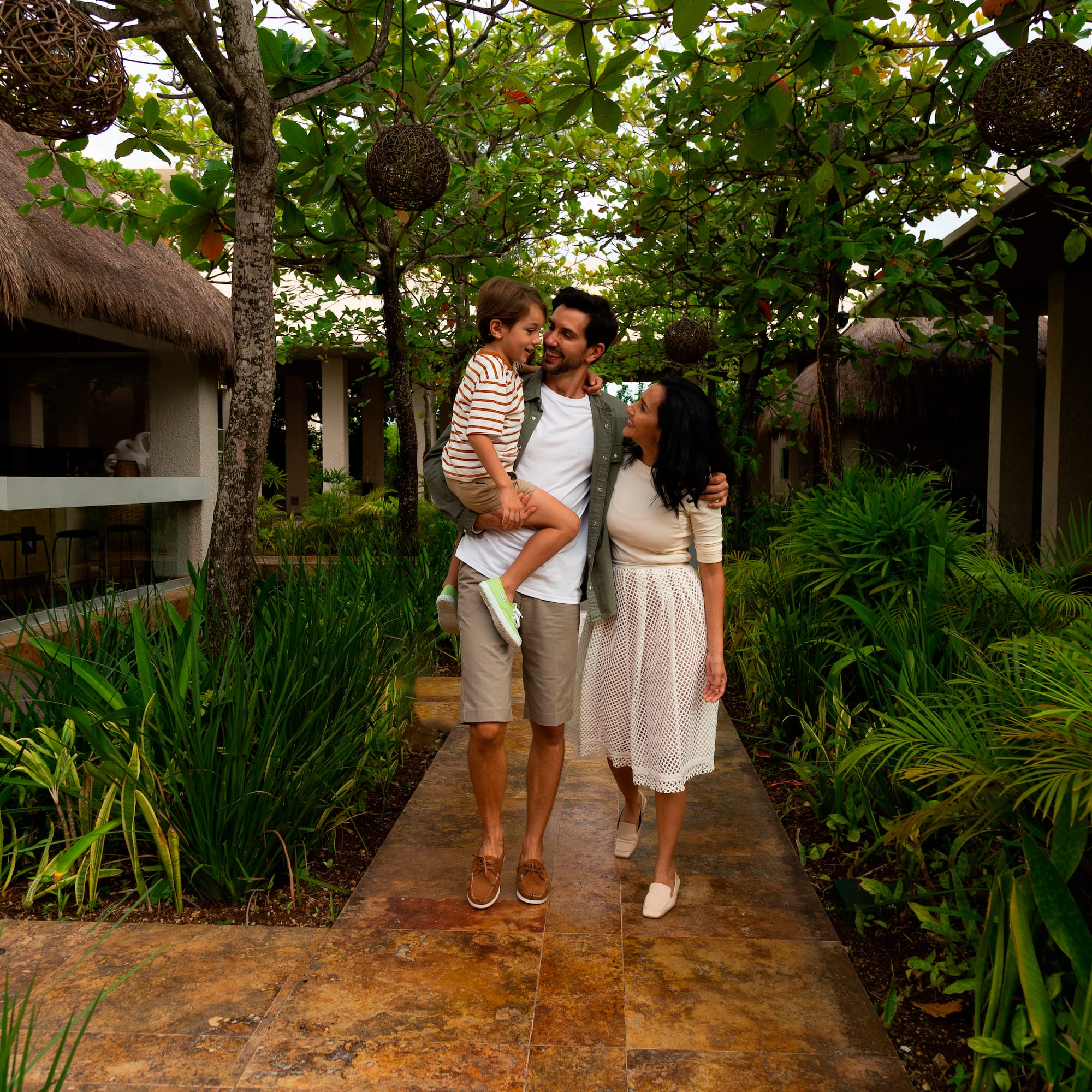 a man holding a child in his arms