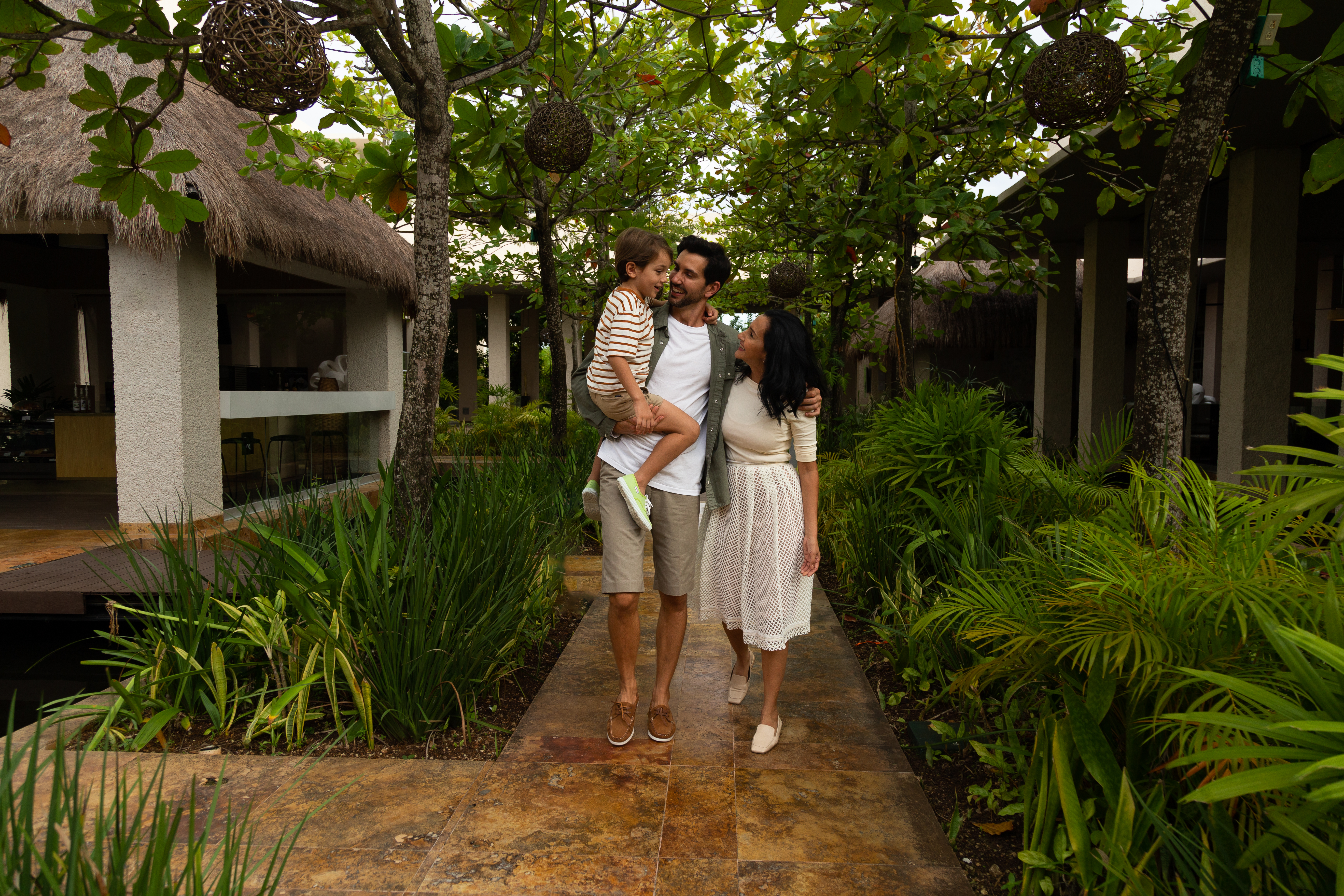a man holding a child in his arms