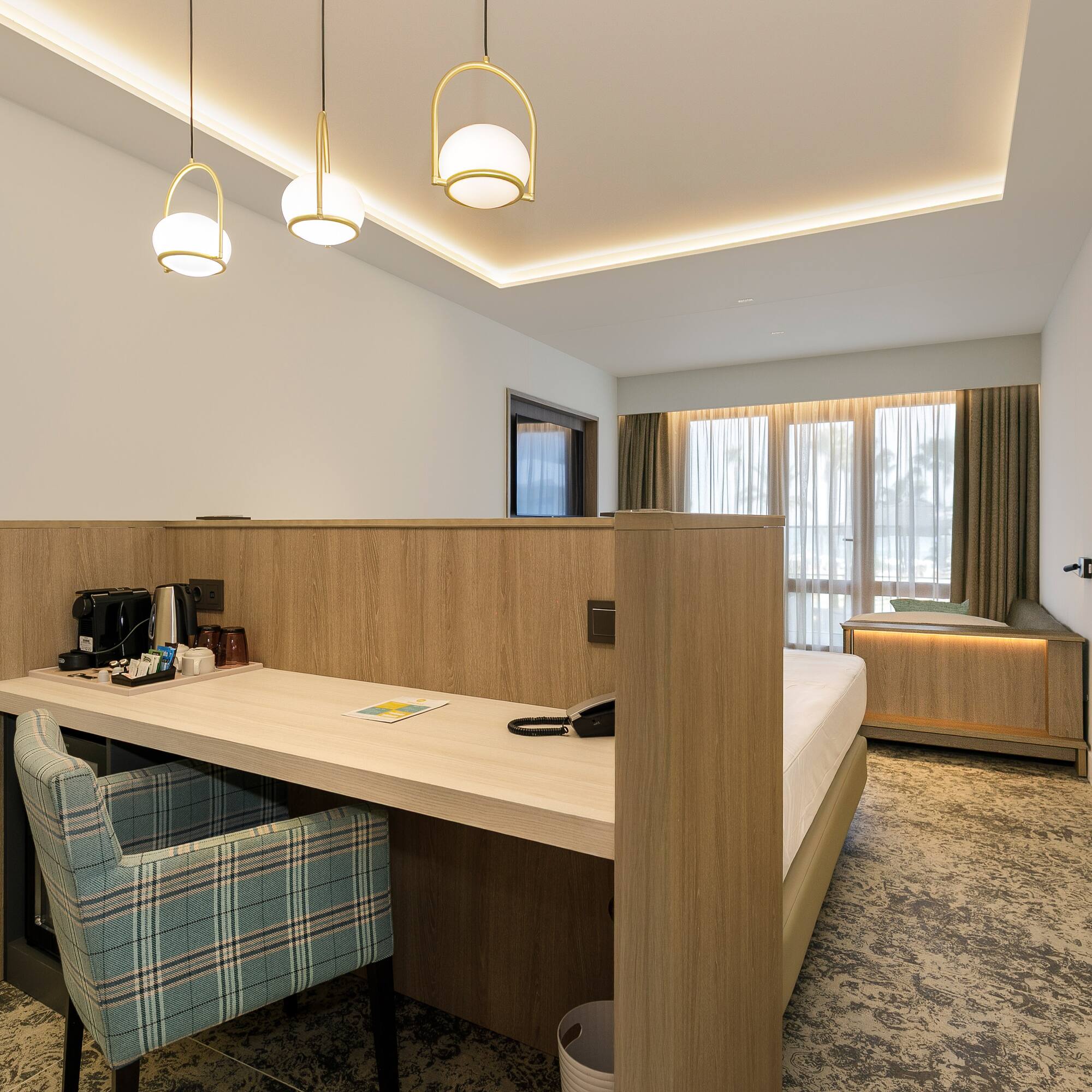 a room with a bed and a desk