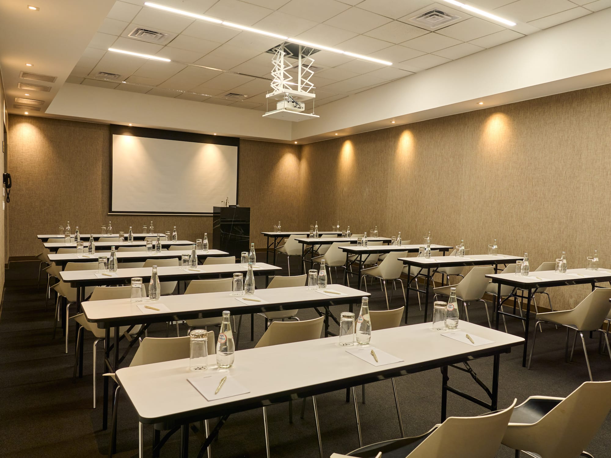 a room with tables and chairs