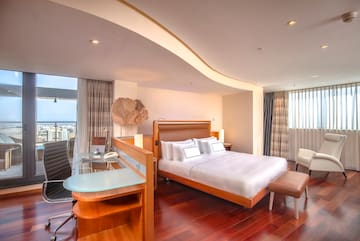 a room with a bed and a table