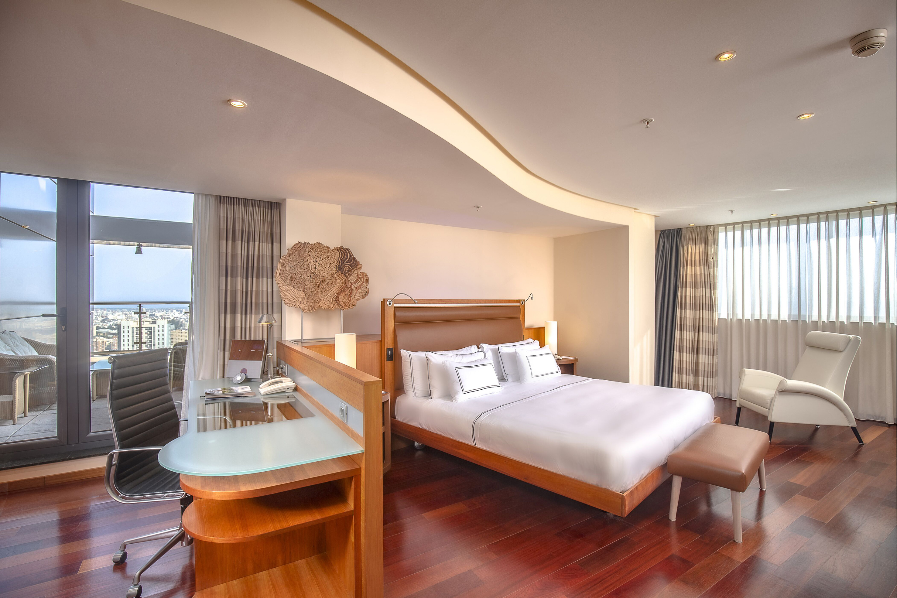 a room with a bed and a table