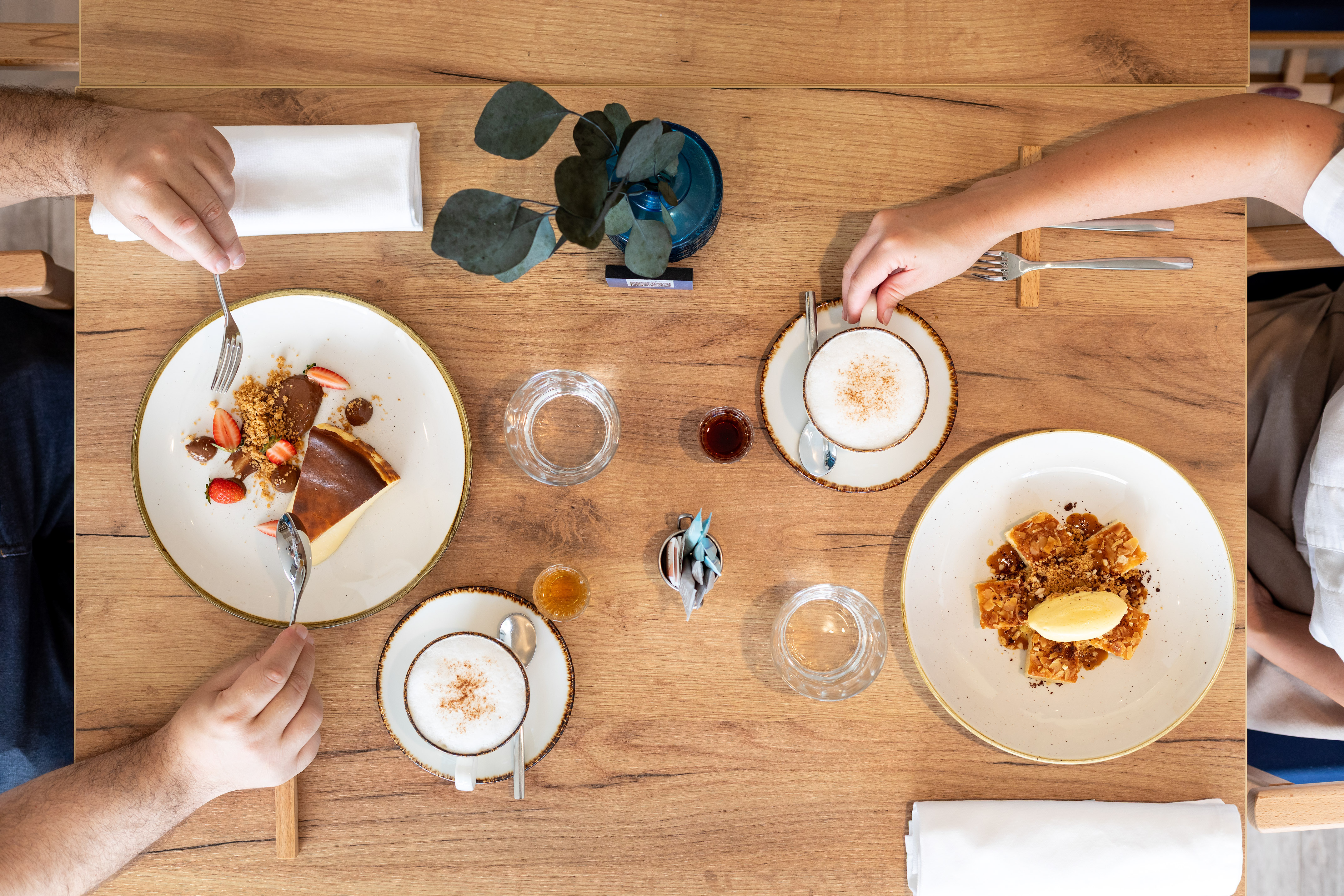 a group of people eating at a table