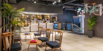 a room with chairs and tables