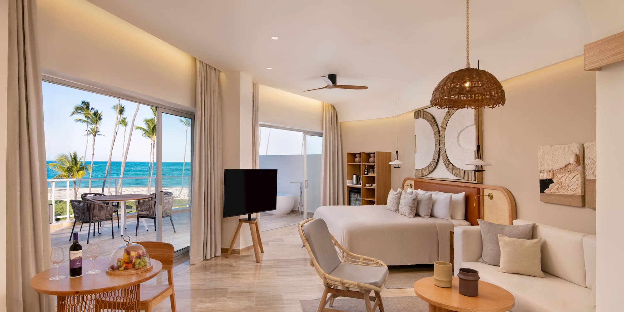 a room with a bed and a television