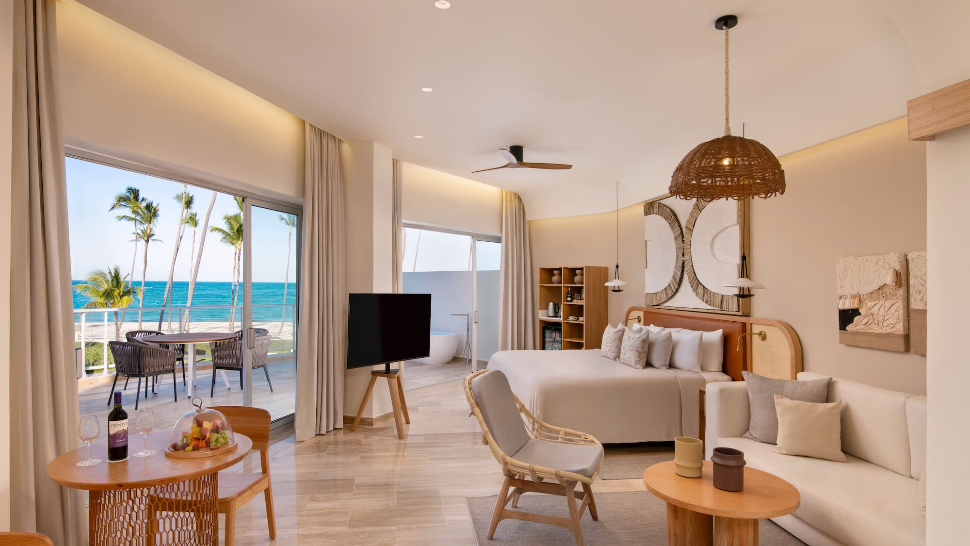 a room with a bed and a television