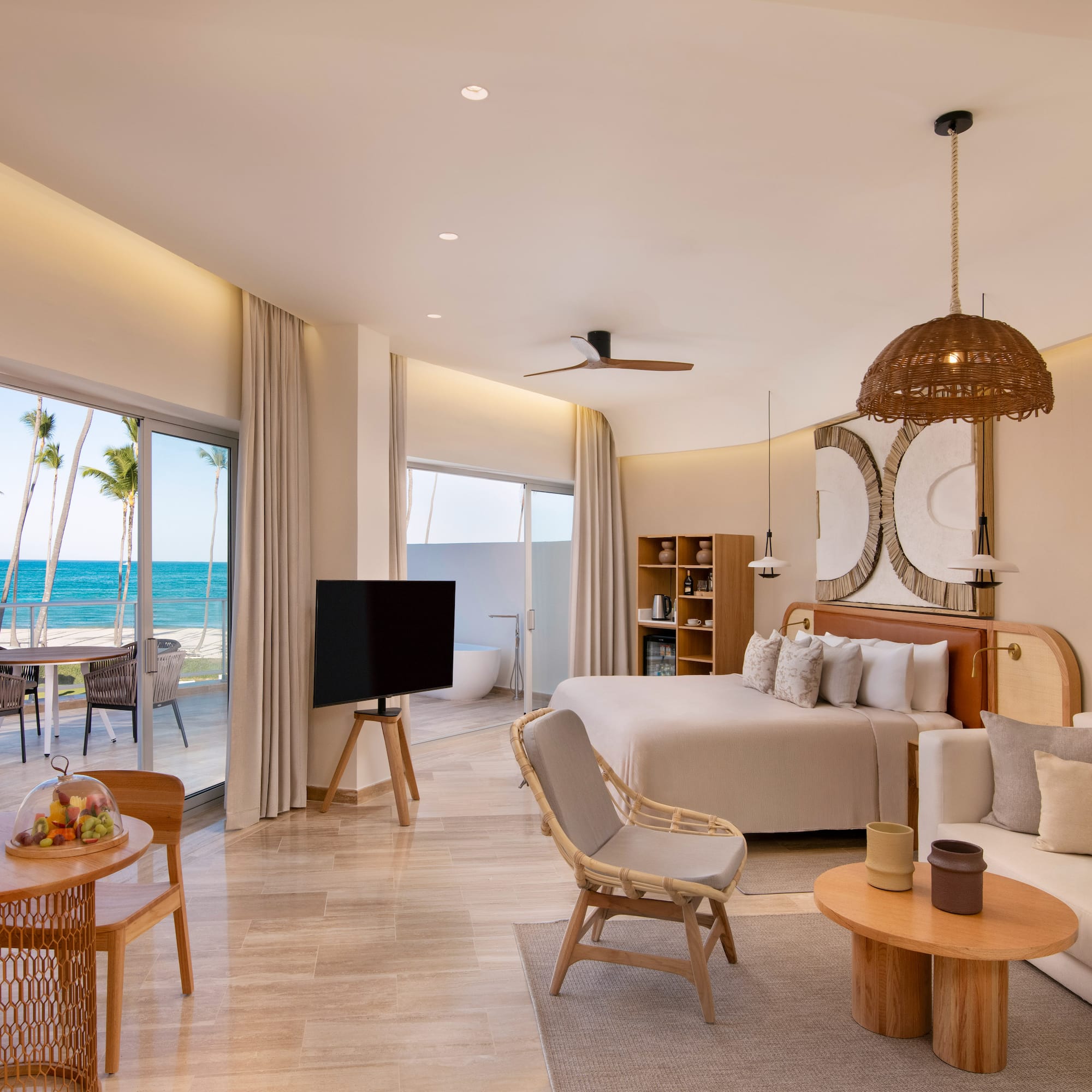 a room with a bed and a television