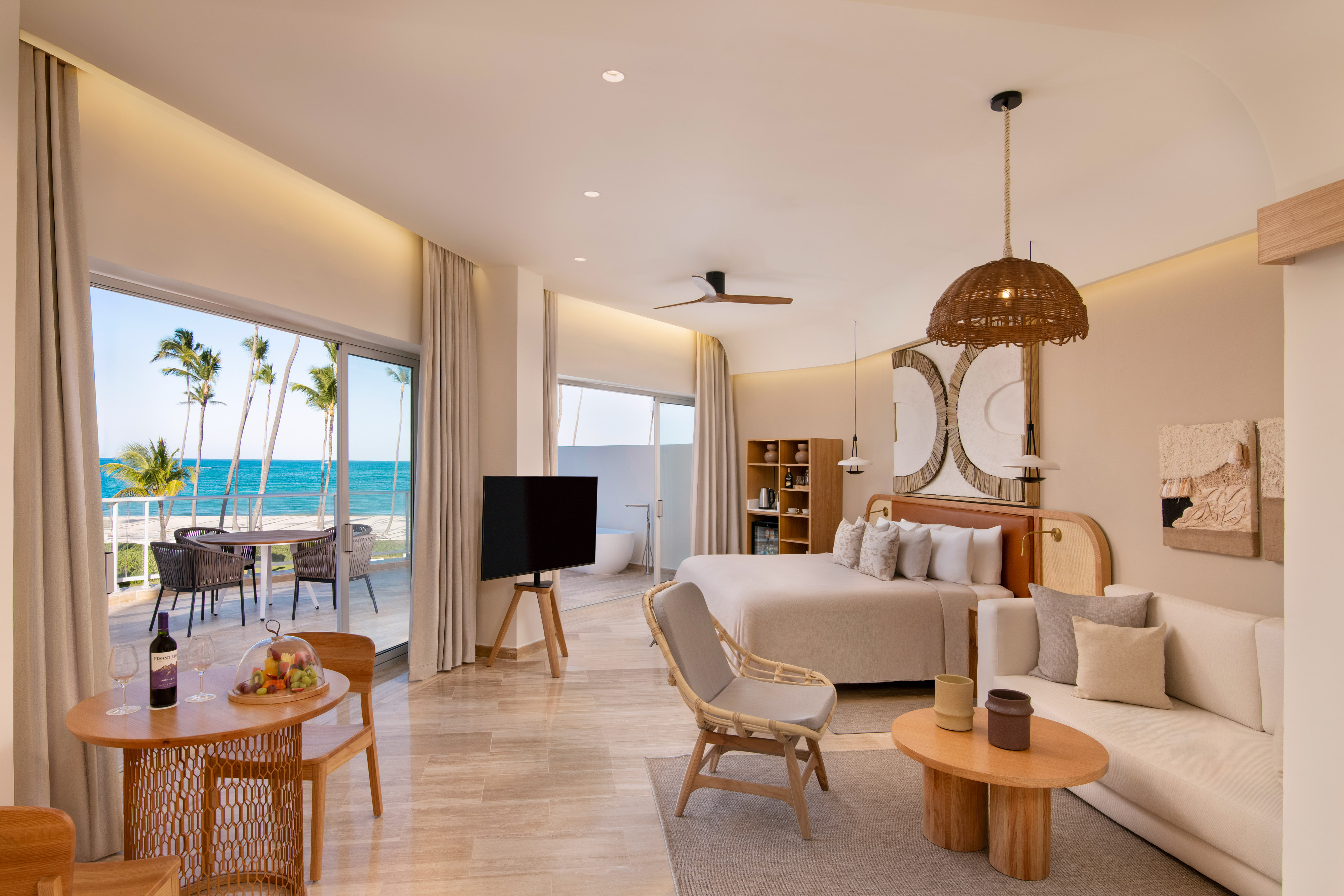 a room with a bed and a television