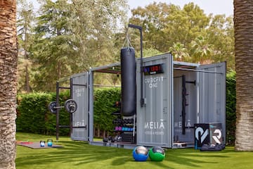 a box with weights and a punching bag on it
