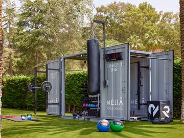 a box with weights and a punching bag on it