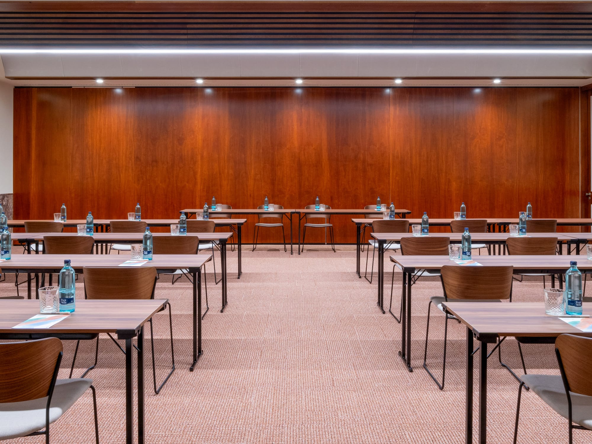 a room with tables and chairs