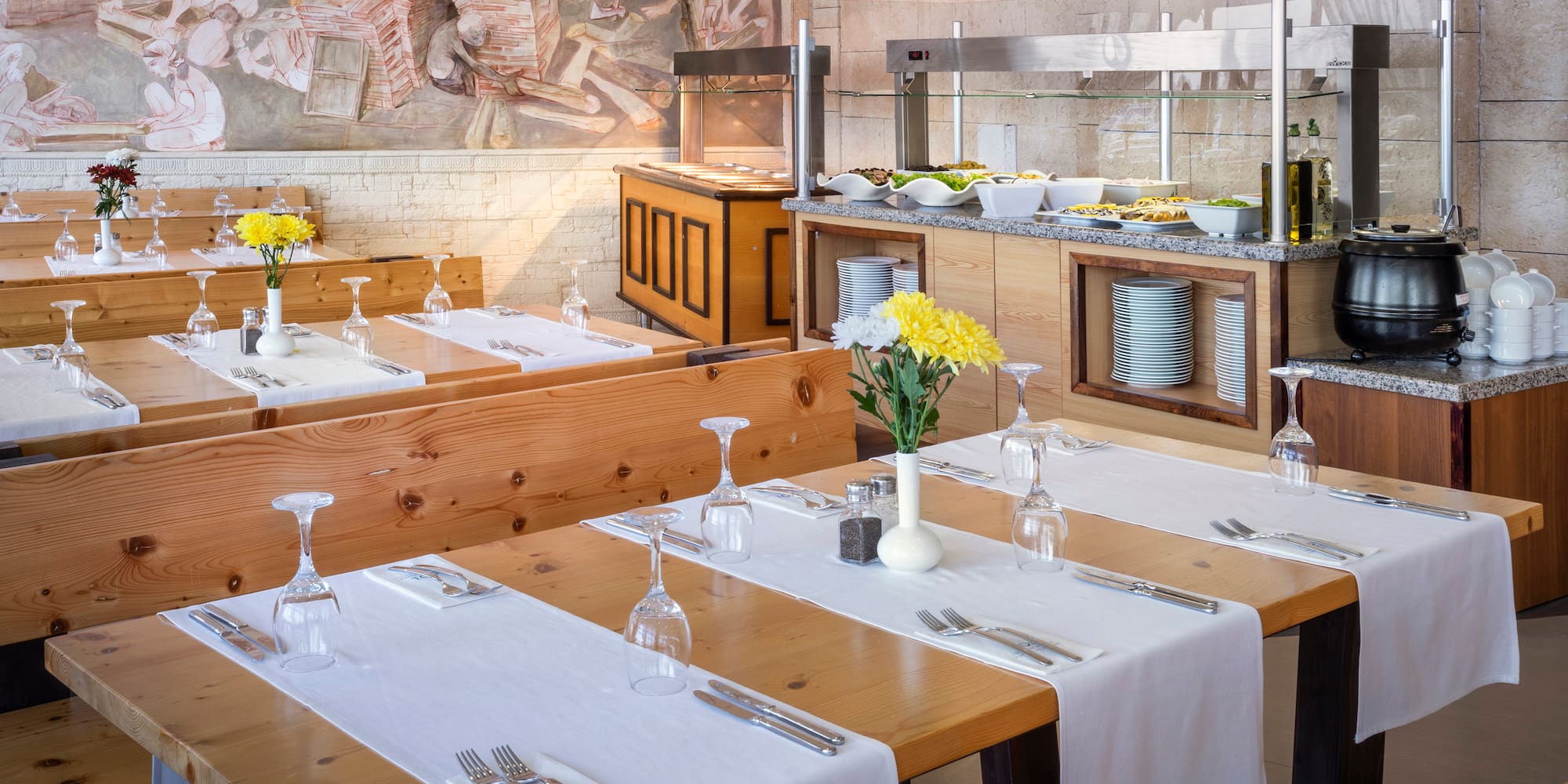 a restaurant with tables and chairs