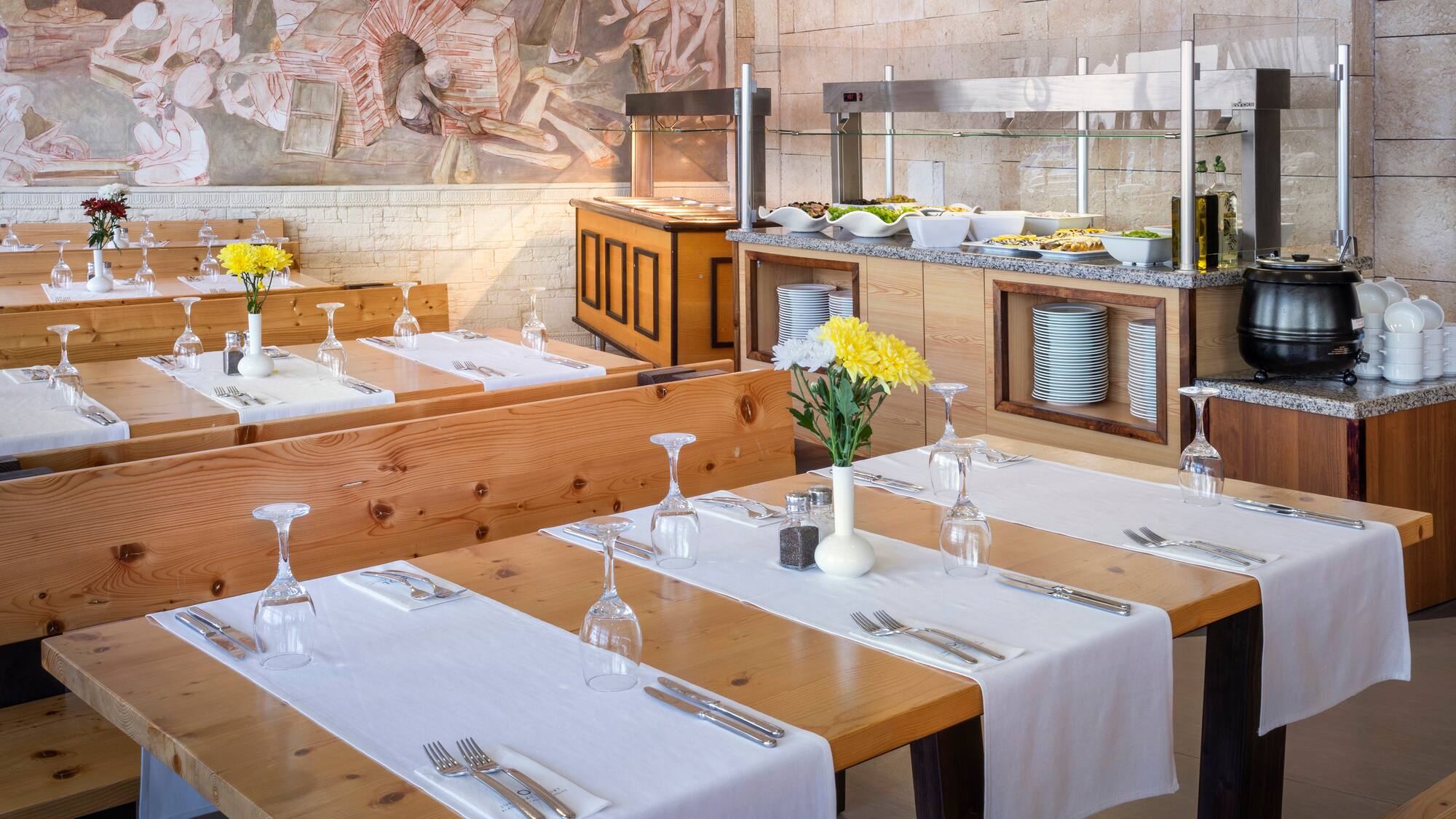 a restaurant with tables and chairs