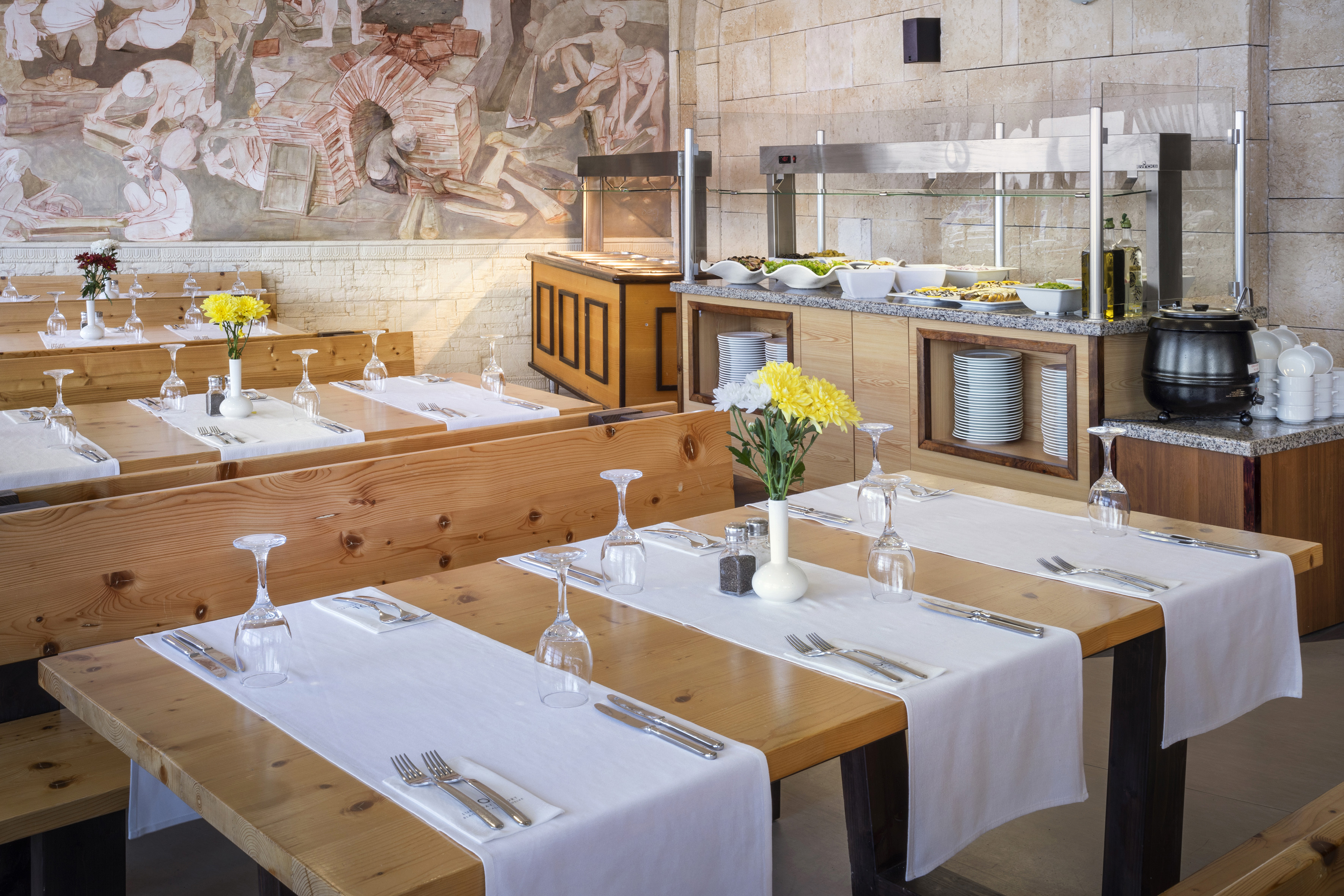 a restaurant with tables and chairs