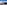 a snowy mountain range with a small village