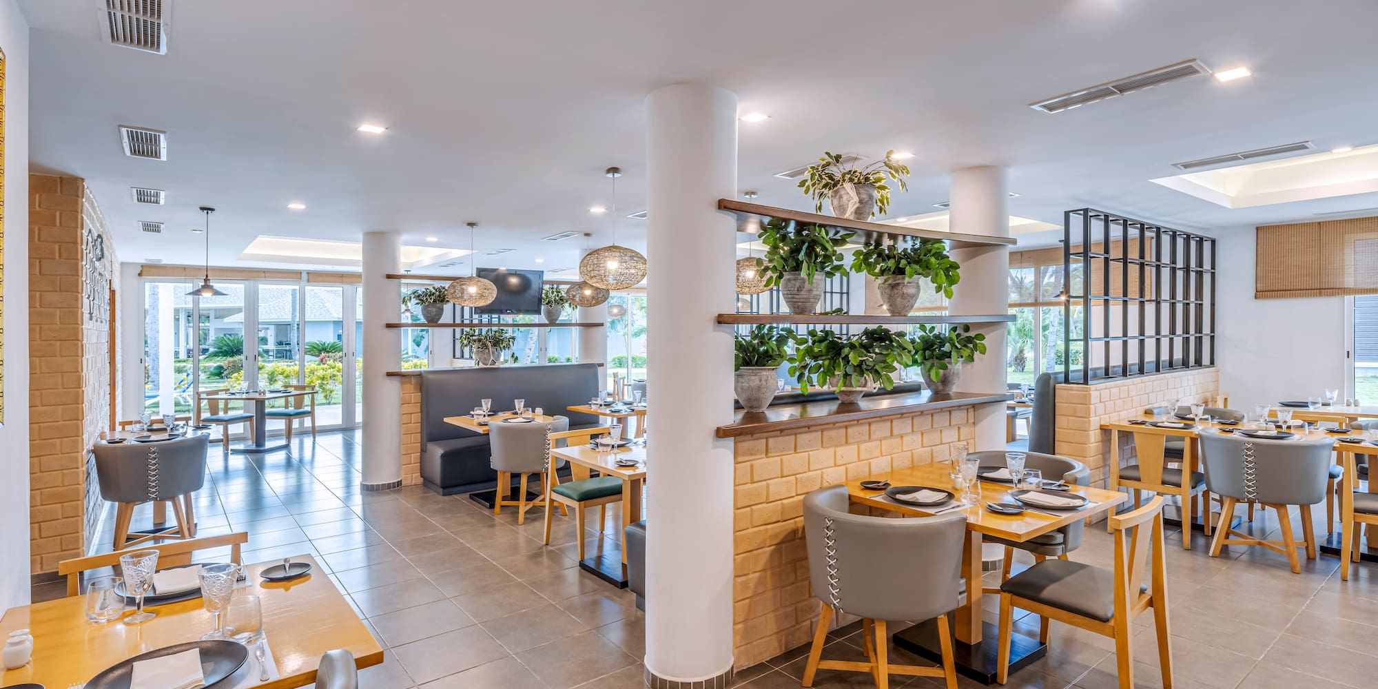 a restaurant with tables and chairs