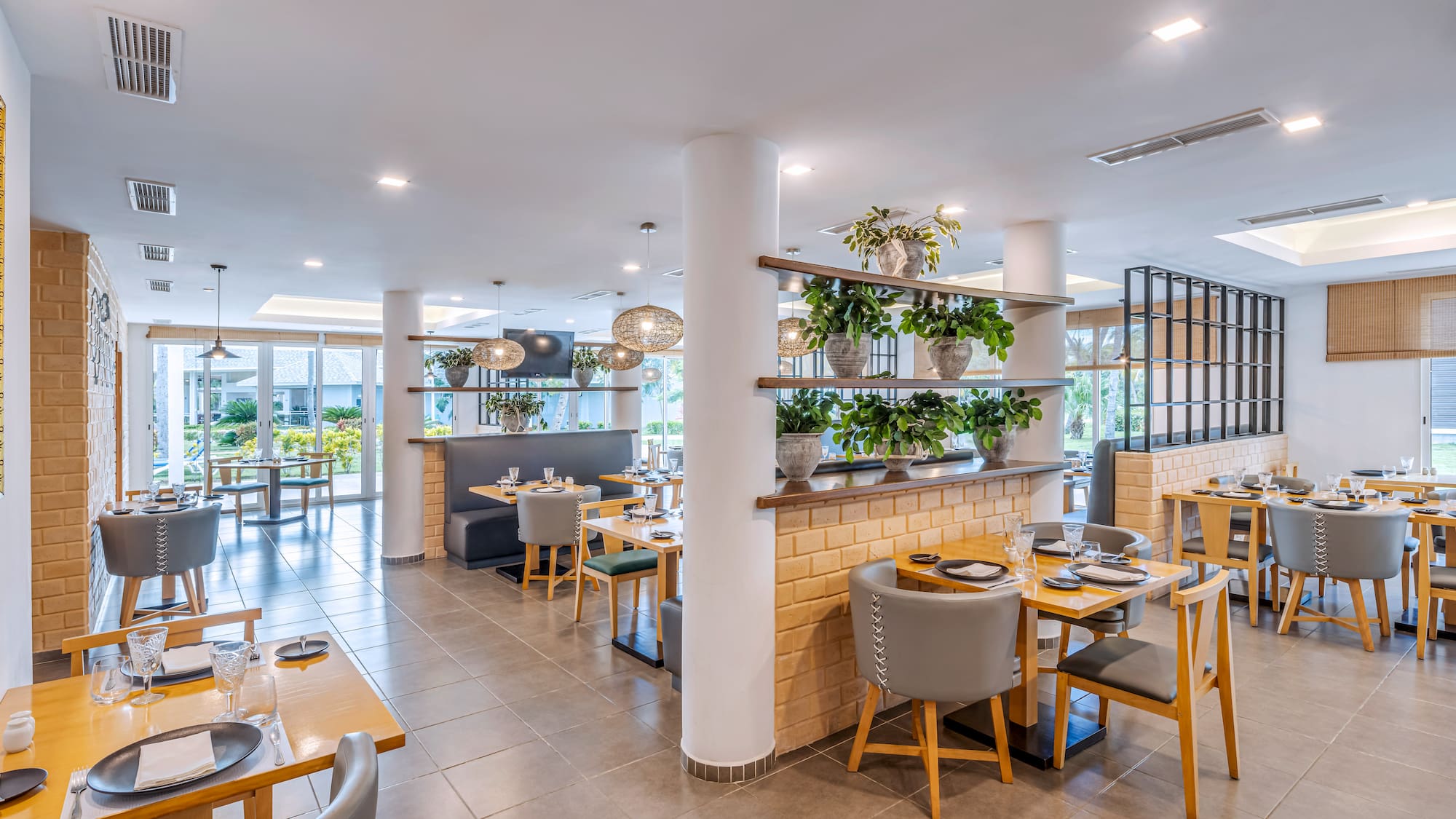 a restaurant with tables and chairs