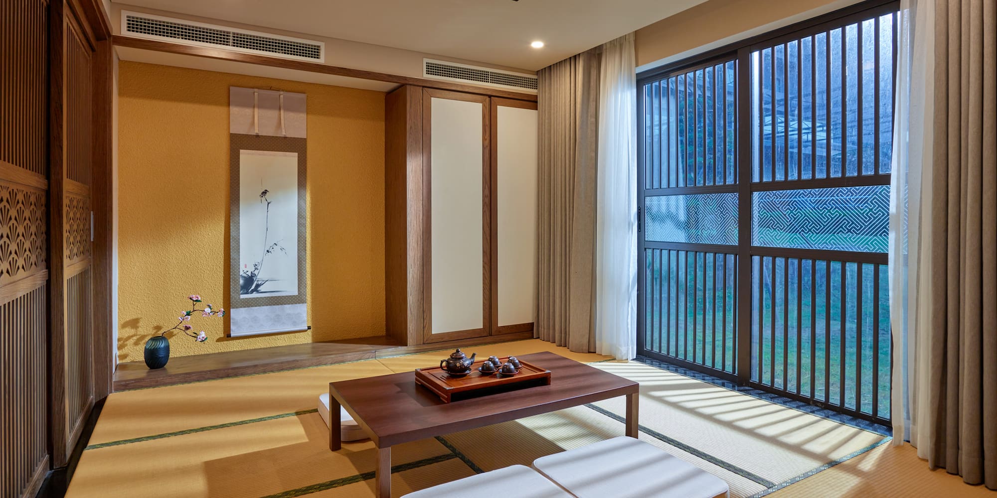 a room with a table and chairs