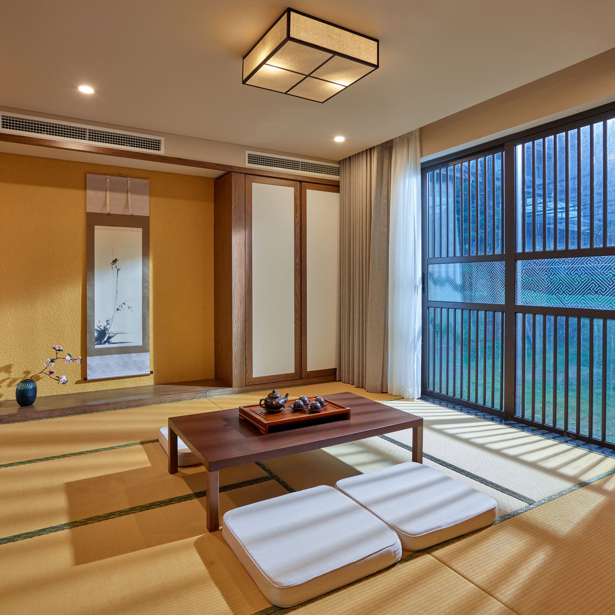 a room with a table and chairs