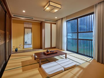 a room with a table and chairs