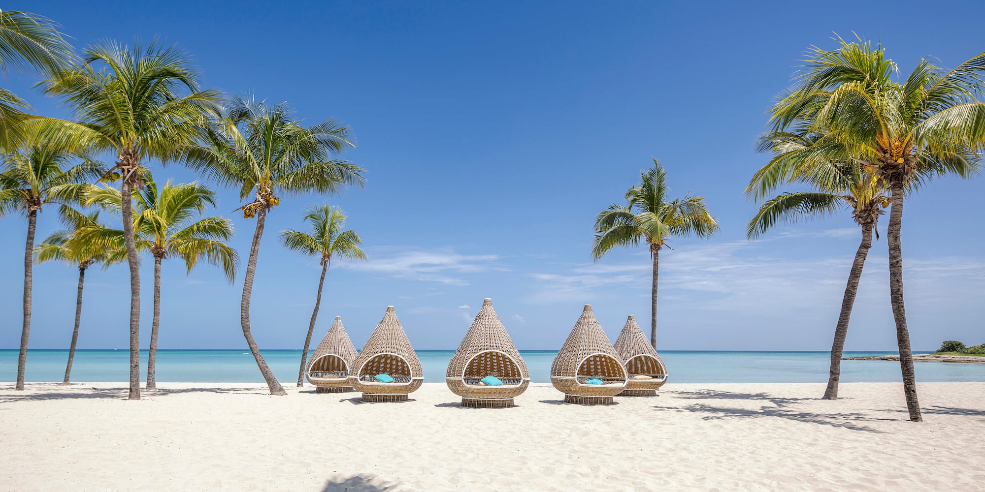 a group of chairs on a beach