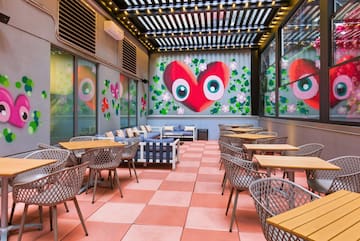 a room with tables and chairs