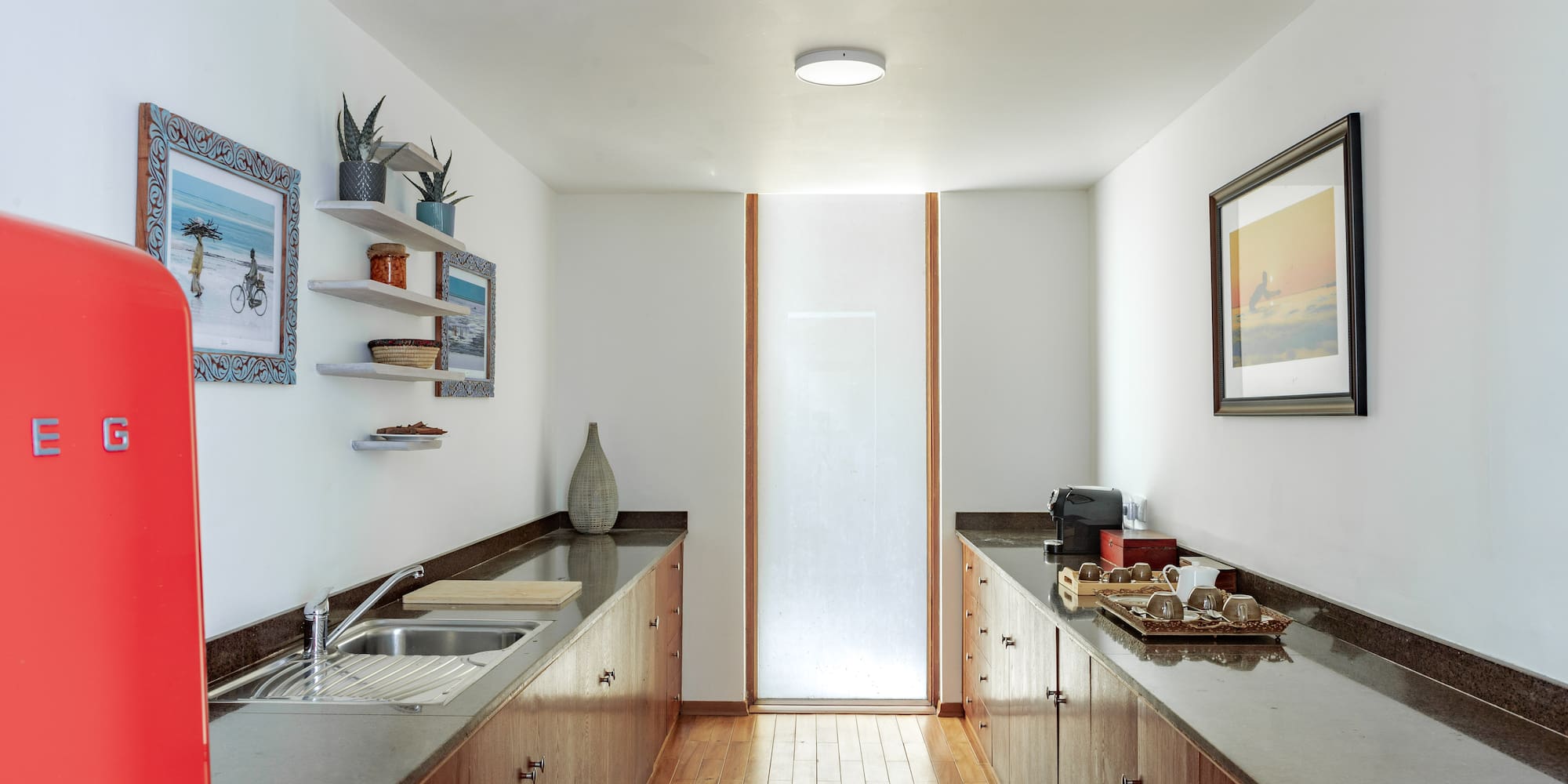 a kitchen with wood cabinets and sink