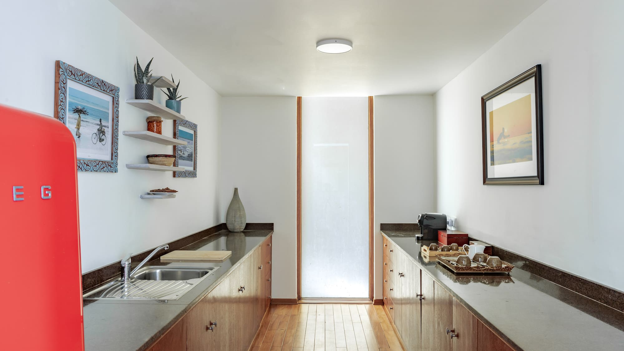 a kitchen with wood cabinets and sink