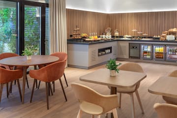 a room with a buffet and a table