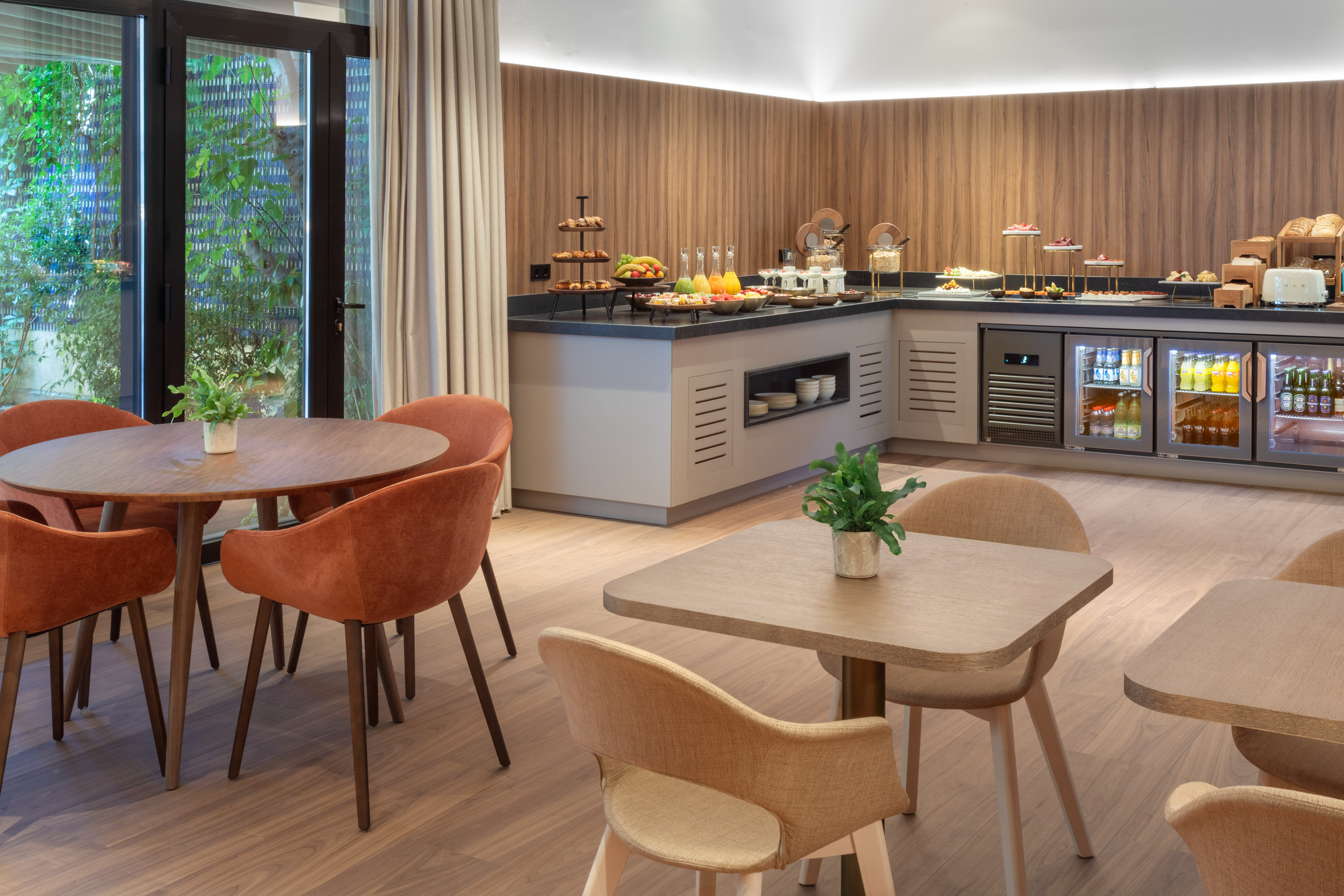 a room with a buffet and a table