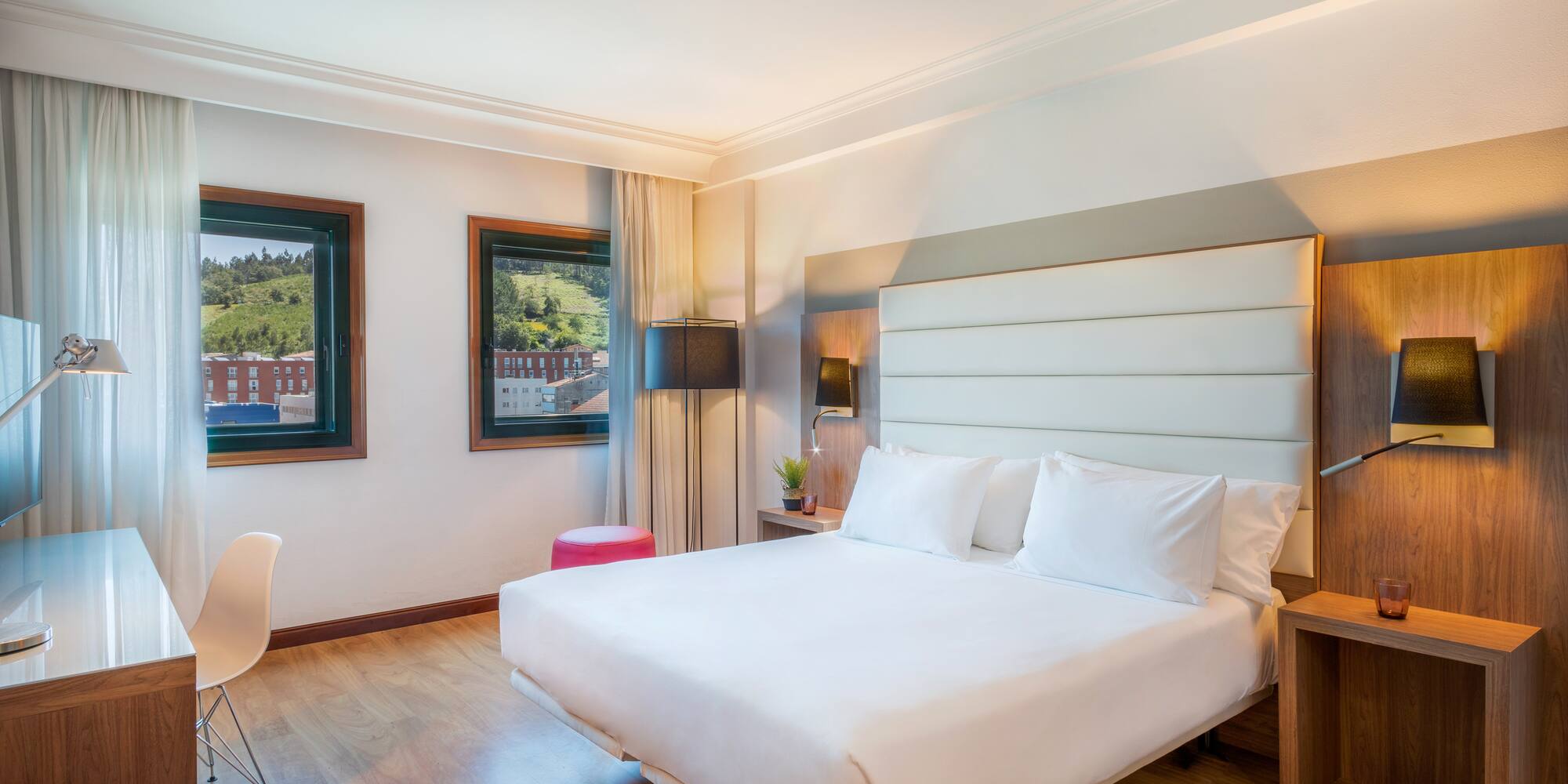 a room with a bed and a chair