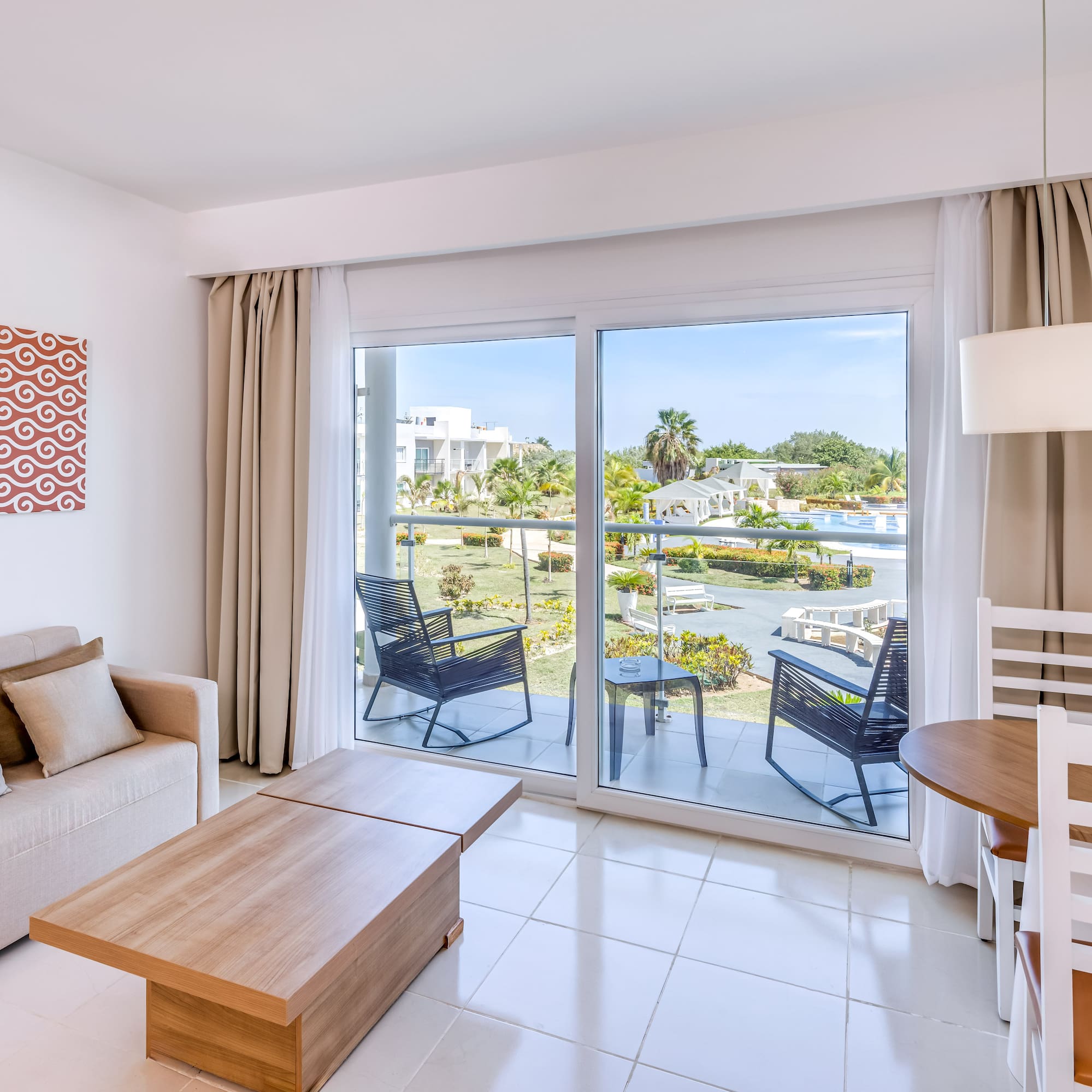 a living room with a sliding glass door