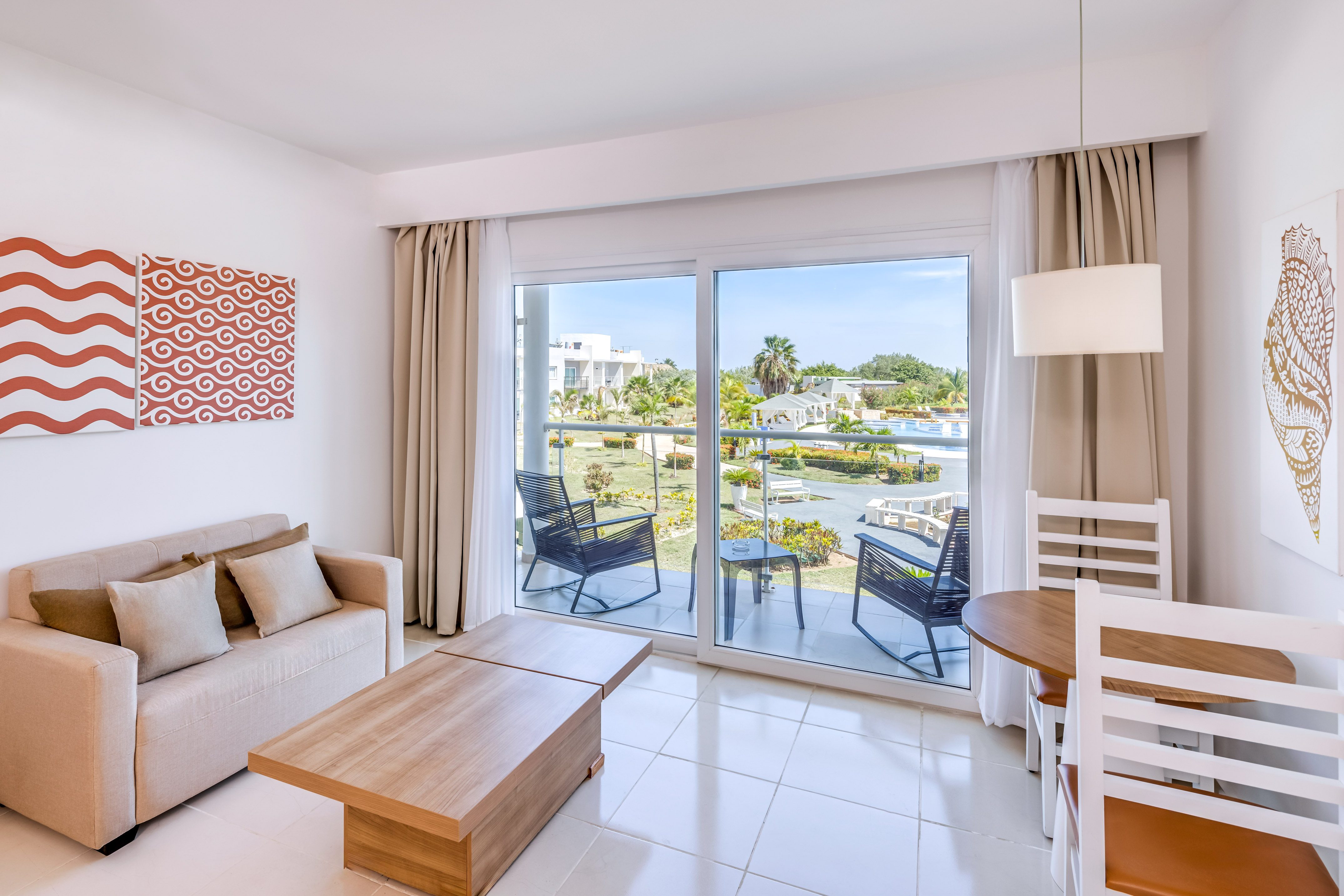 a living room with a sliding glass door