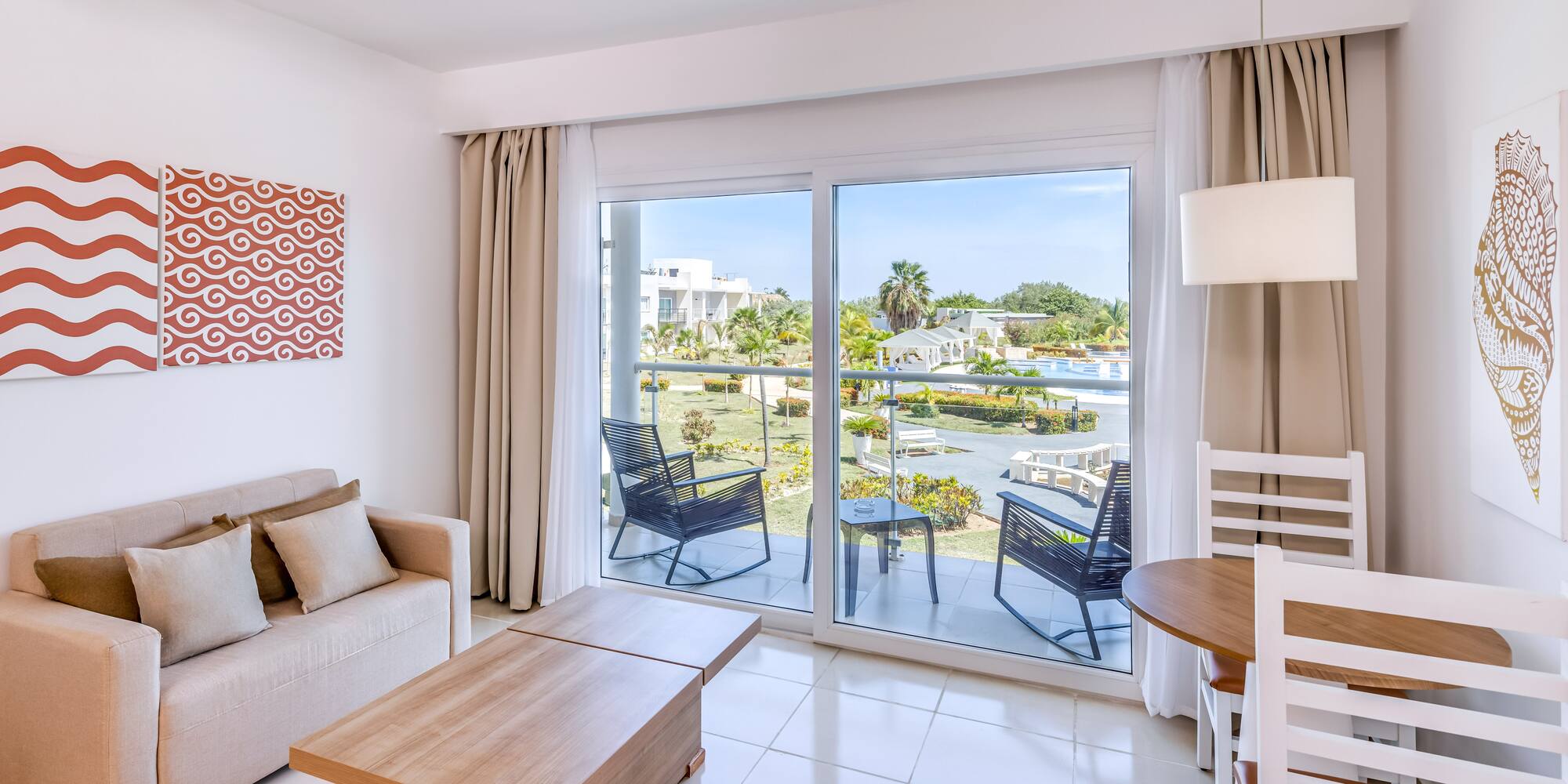 a living room with a sliding glass door