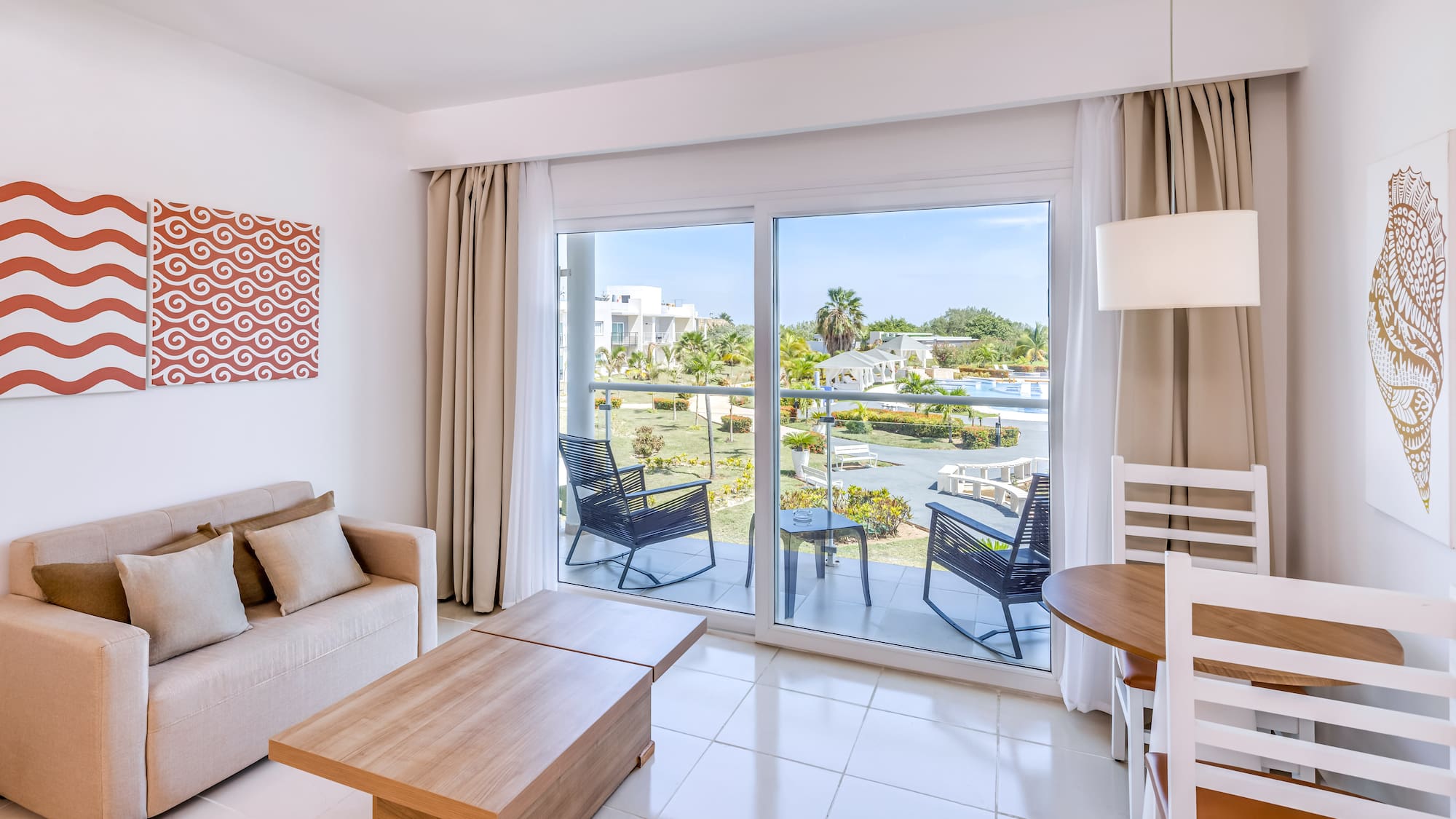 a living room with a sliding glass door