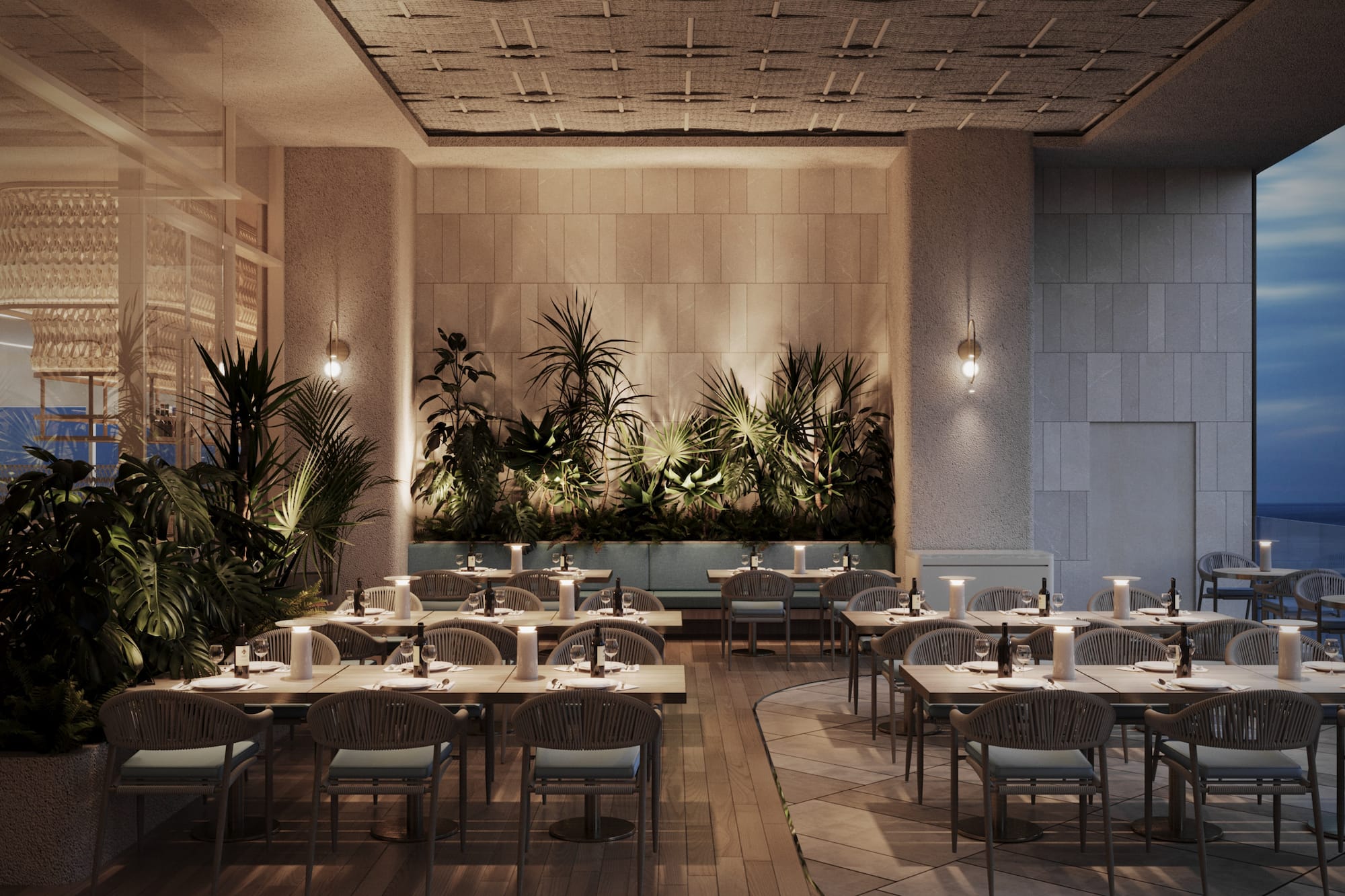 Elegant outdoor restaurant with tropical plants, modern dining tables, and warm lighting.