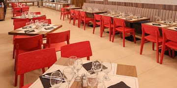 a room with tables and chairs