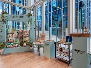 a display of items in a room with windows