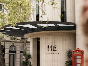 a building with a red telephone booth