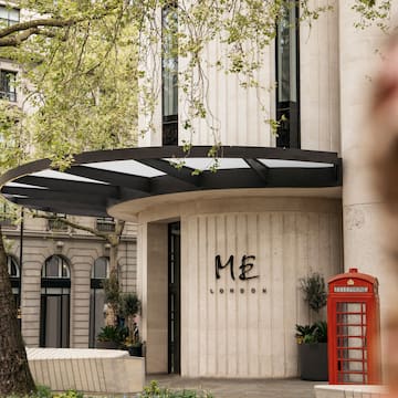 a building with a red telephone booth