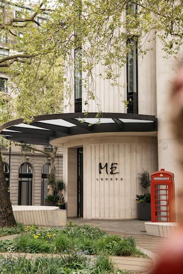 a building with a red telephone booth