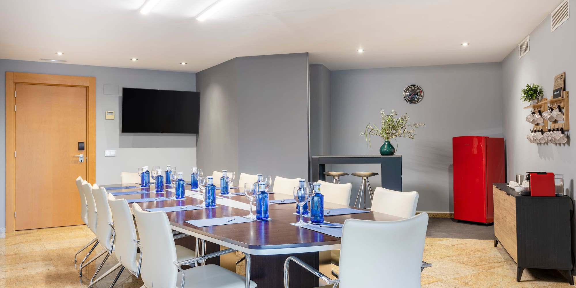 a room with a table and chairs