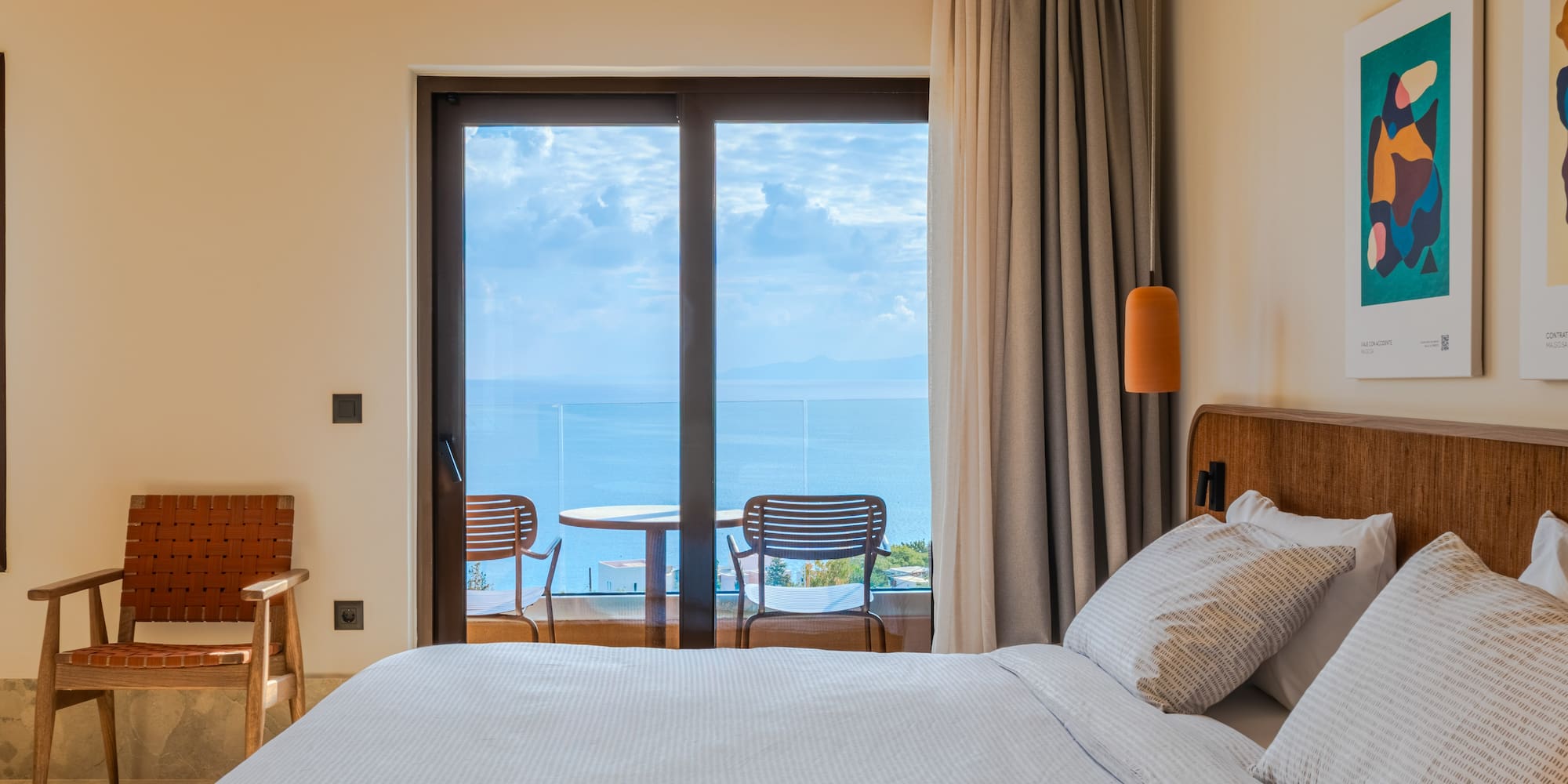 a bed with a view of the ocean
