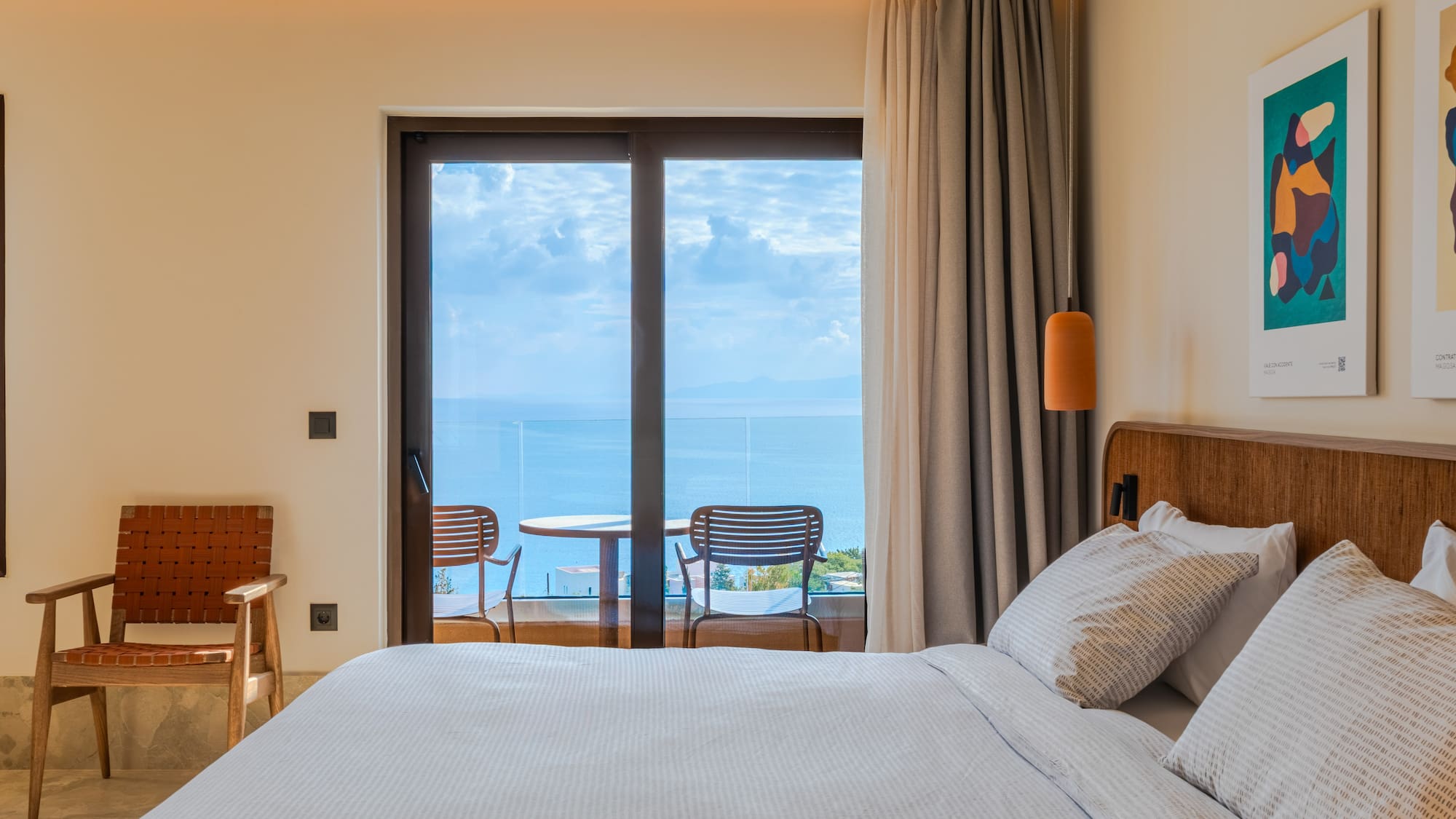 a bed with a view of the ocean