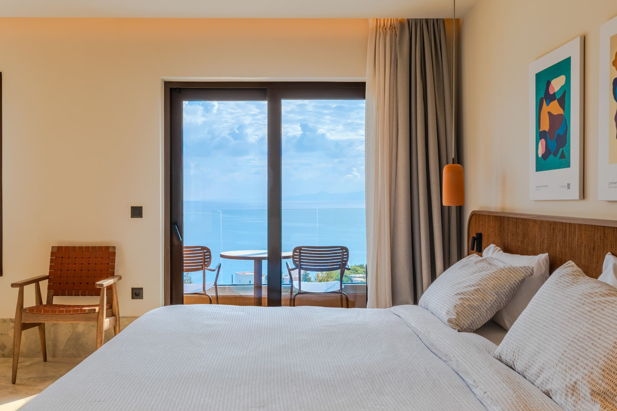 a bed with a view of the ocean